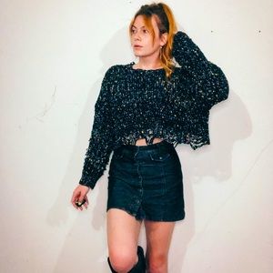 Distressed confetti sweater